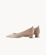 Nude close toed point toe heels