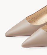 Nude close toed point toe heels