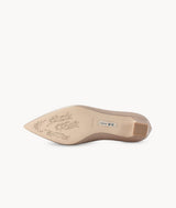 Nude close toed point toe heels