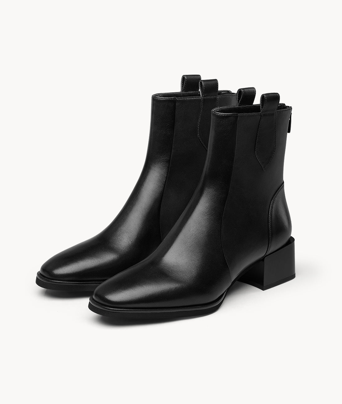 Front view of women's stylish black ankle boots in soft lambskin