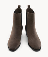 Front view of women's brown suede Chelsea boots, highlighting the elegant almond toe