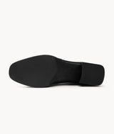 Bottom view of black lambskin ankle boots with a lightweight sole