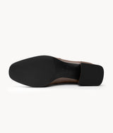 Bottom view of brown lambskin ankle boots with a lightweight sole